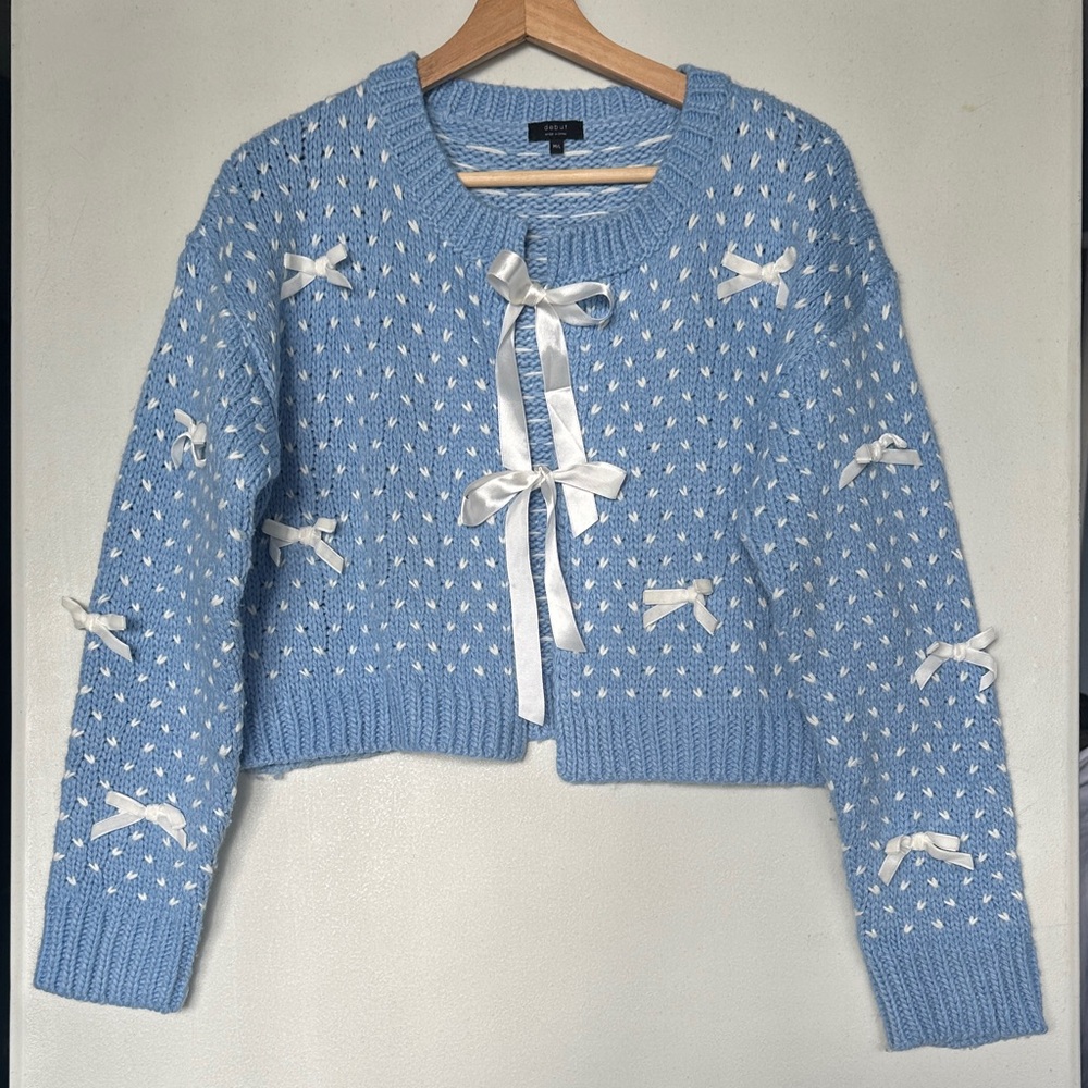 Debut Light Blue Cardigan with White Bow Details.